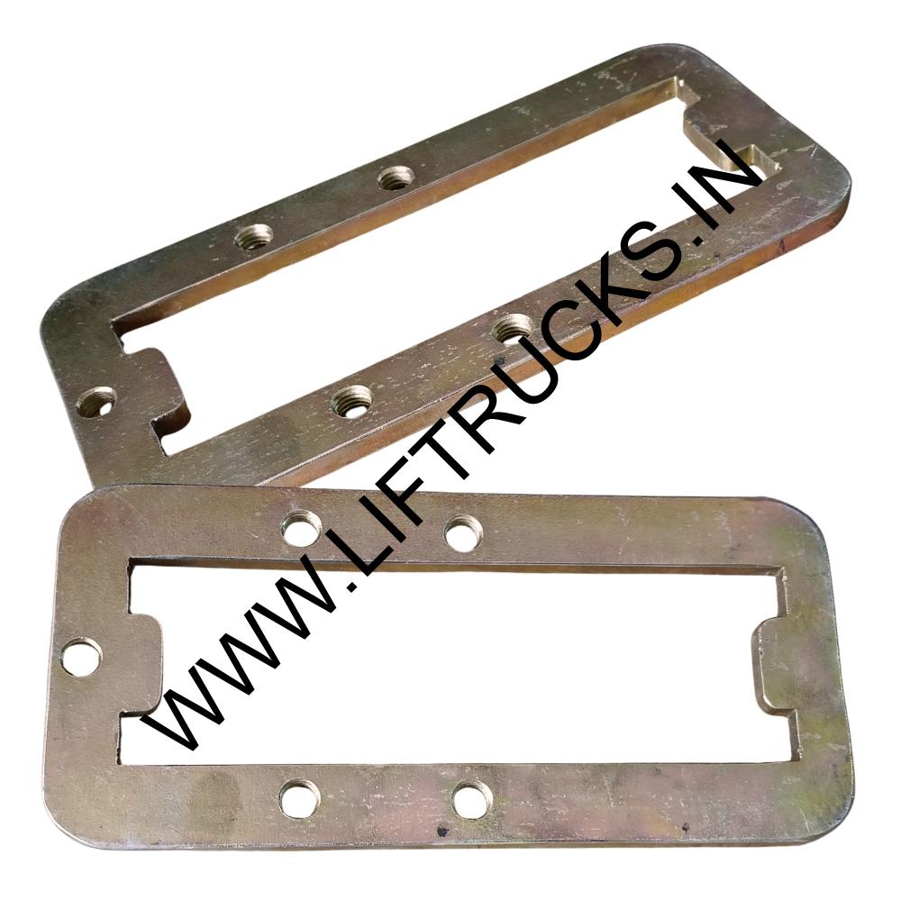 Spreader inner pad metal mounting brackets
